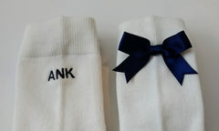 White knee-high socks with navy bows (2 pairs)